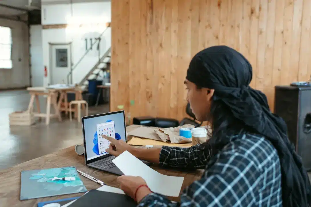 A man looking at a computer