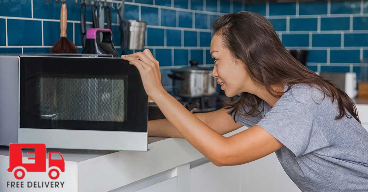 Person cooking food using a high-quality microwave