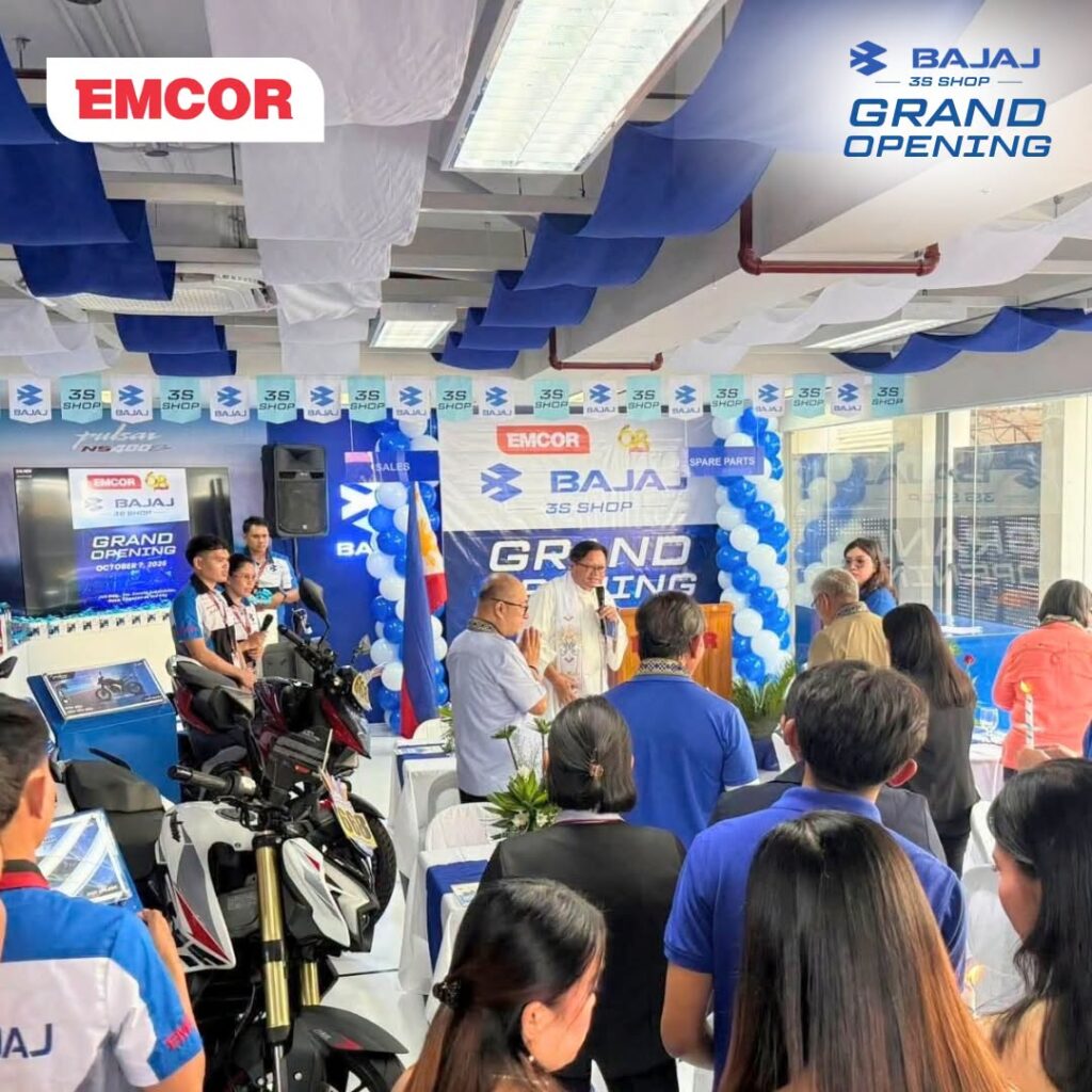 Guests and staff gathered inside the showroom during the opening program